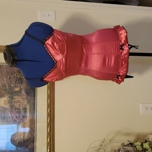 Adorable pink babydoll with tiny black bow accents